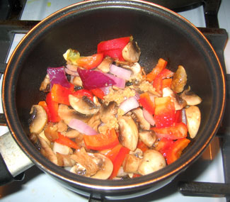 Stir-fried vegetables cooking in pot