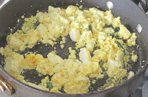 Tofu cooking in pot with all the ingredients