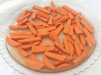  Sweet potato slices spiced and ready for the microwave oven